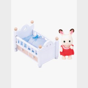 Sylvanian Families Figurs�t Chokoladekaninbaby med Seng