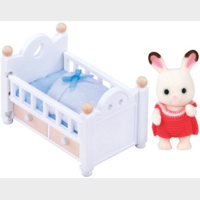 Sylvanian Families Figurs�t Chokoladekaninbaby med Seng